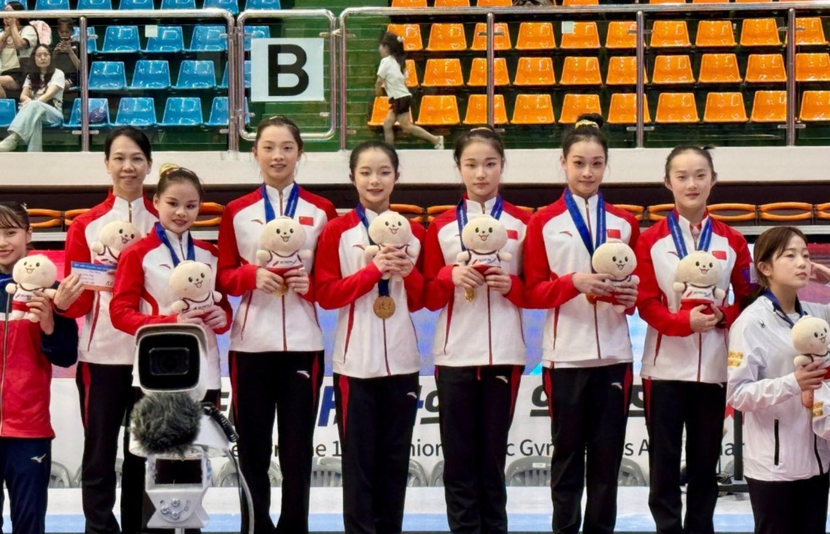 亚运会：中国体操队包揽男女团体冠军